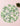 Round placemat with tropical leaf pattern