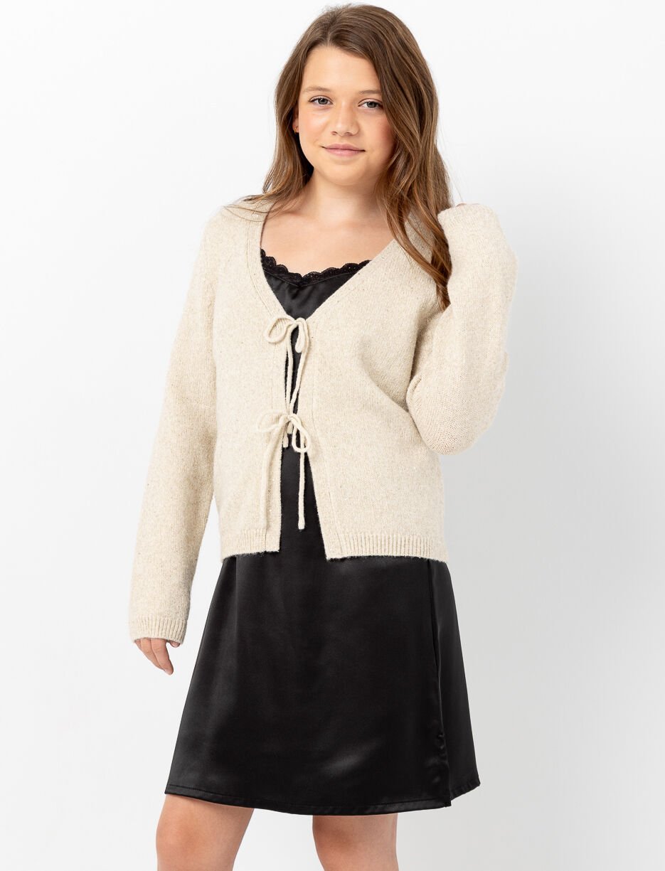 Cardigan en tricot scintillant à noeuds