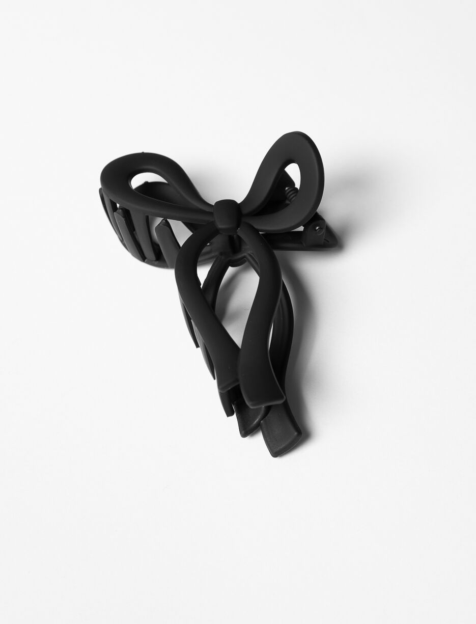 Pince à cheveux en forme de boucle