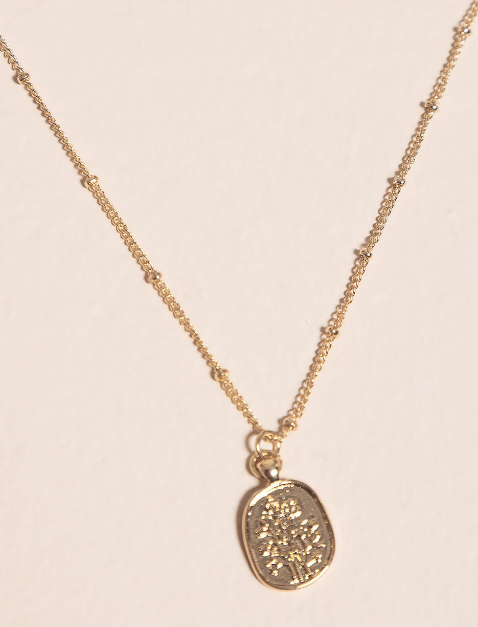 Pendentif doré avec médaillon