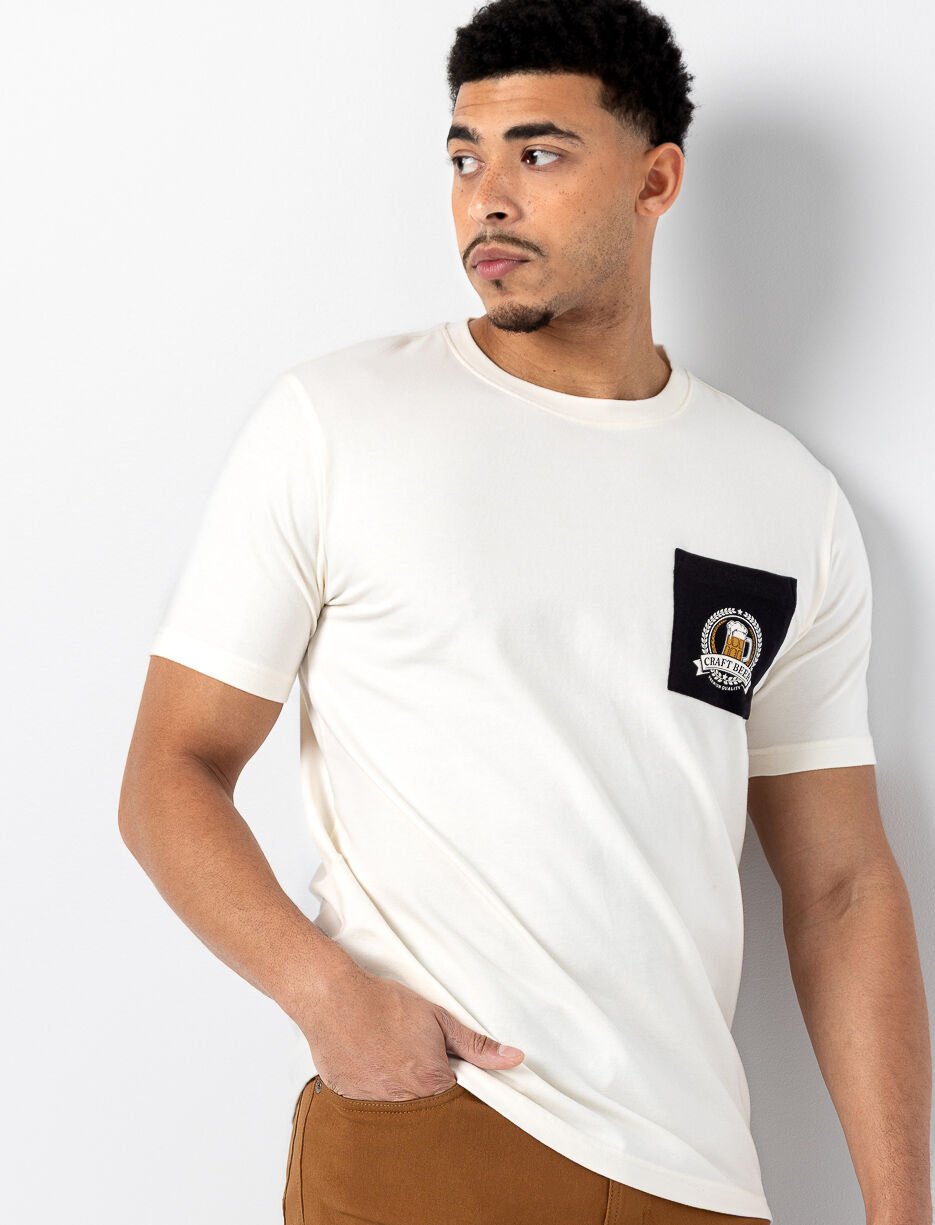 T-shirt uni &agrave; poche imprim&eacute;e