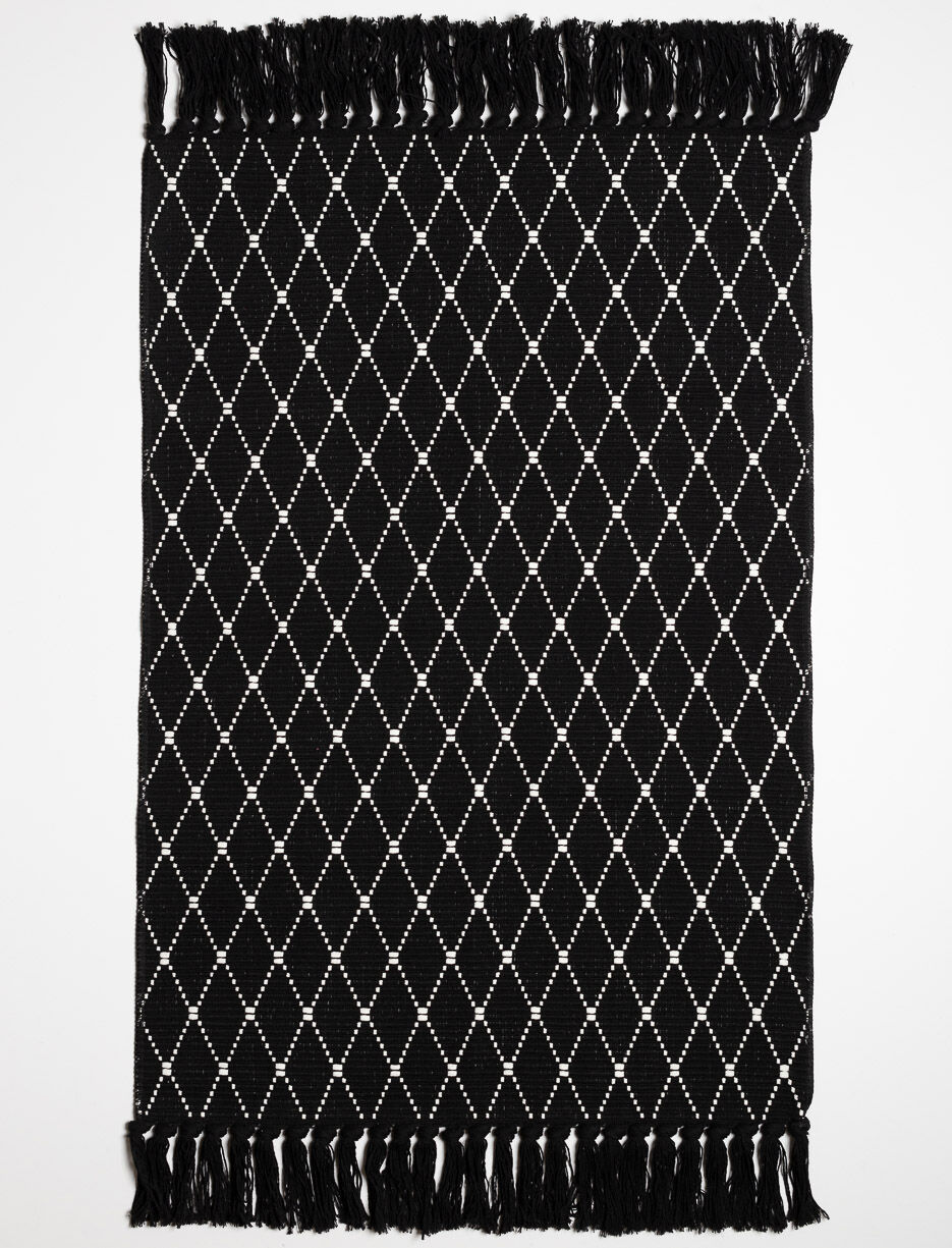 Tapis à motifs avec franges