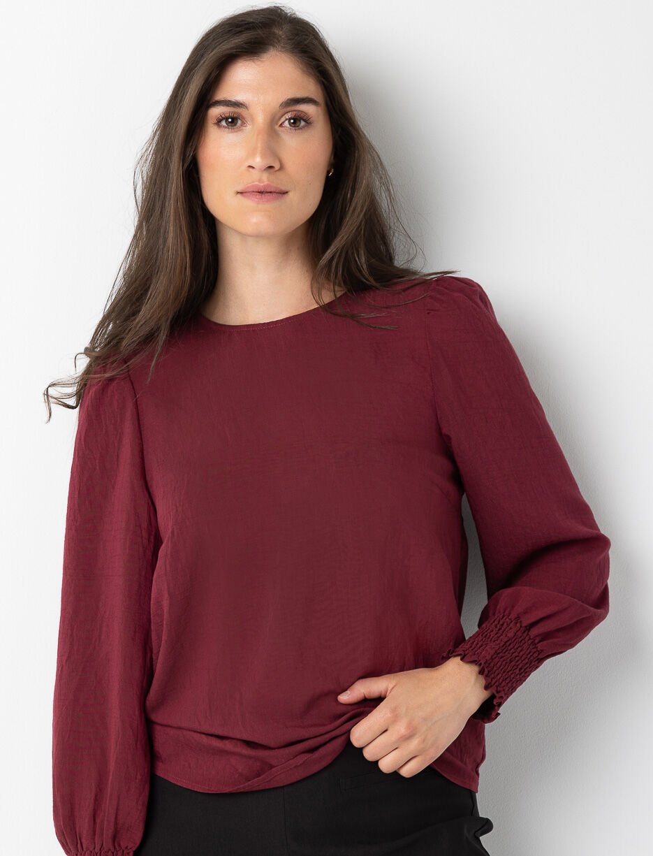 Blouse texturée à manches bouffantes