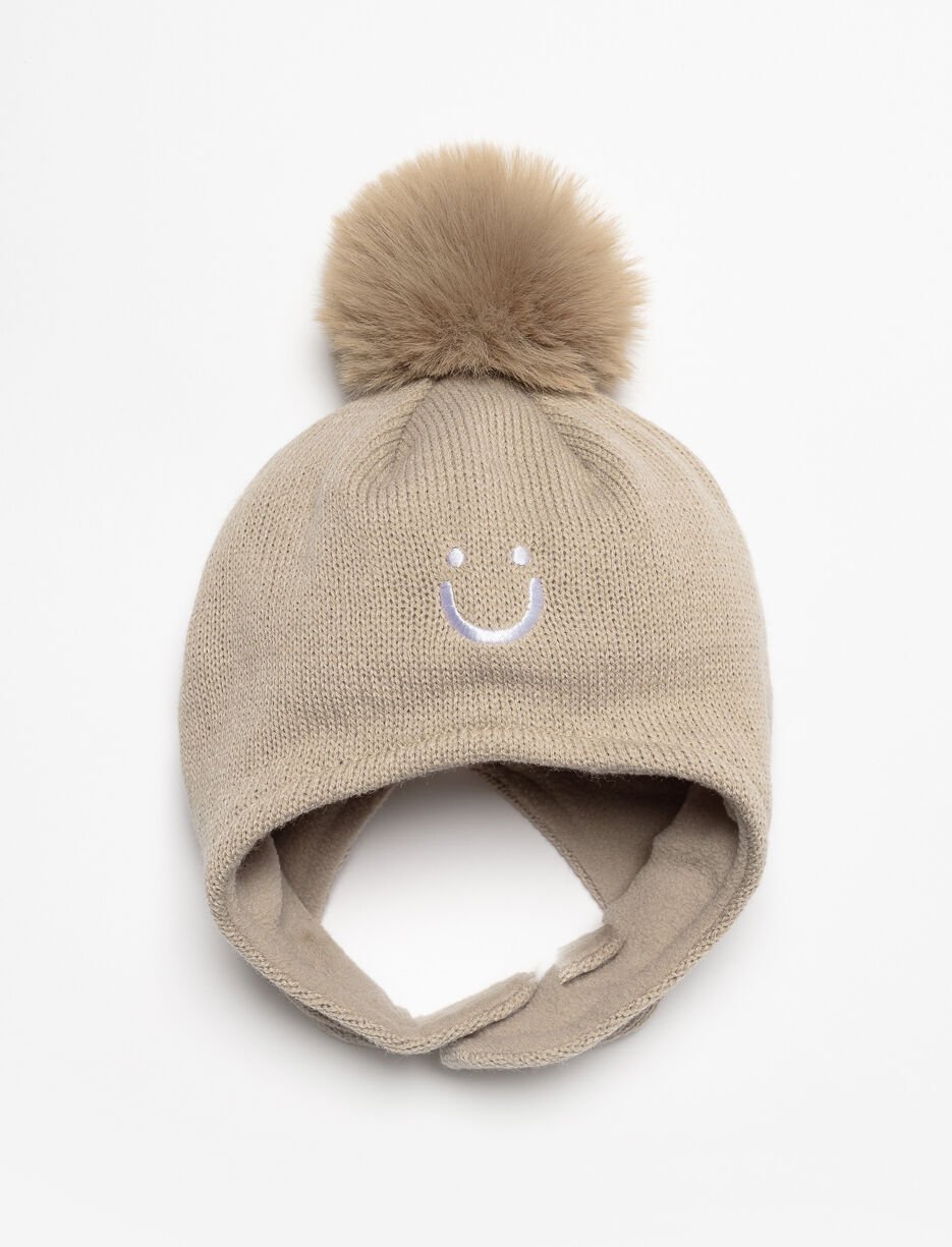 Tuque en tricot à pompon