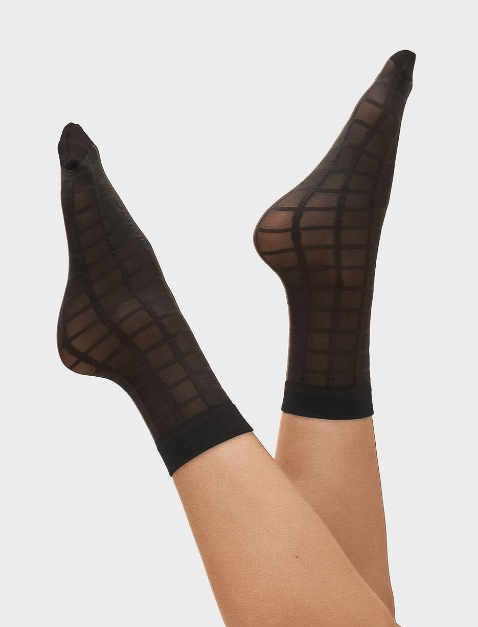 Chaussettes diaphanes à carreaux