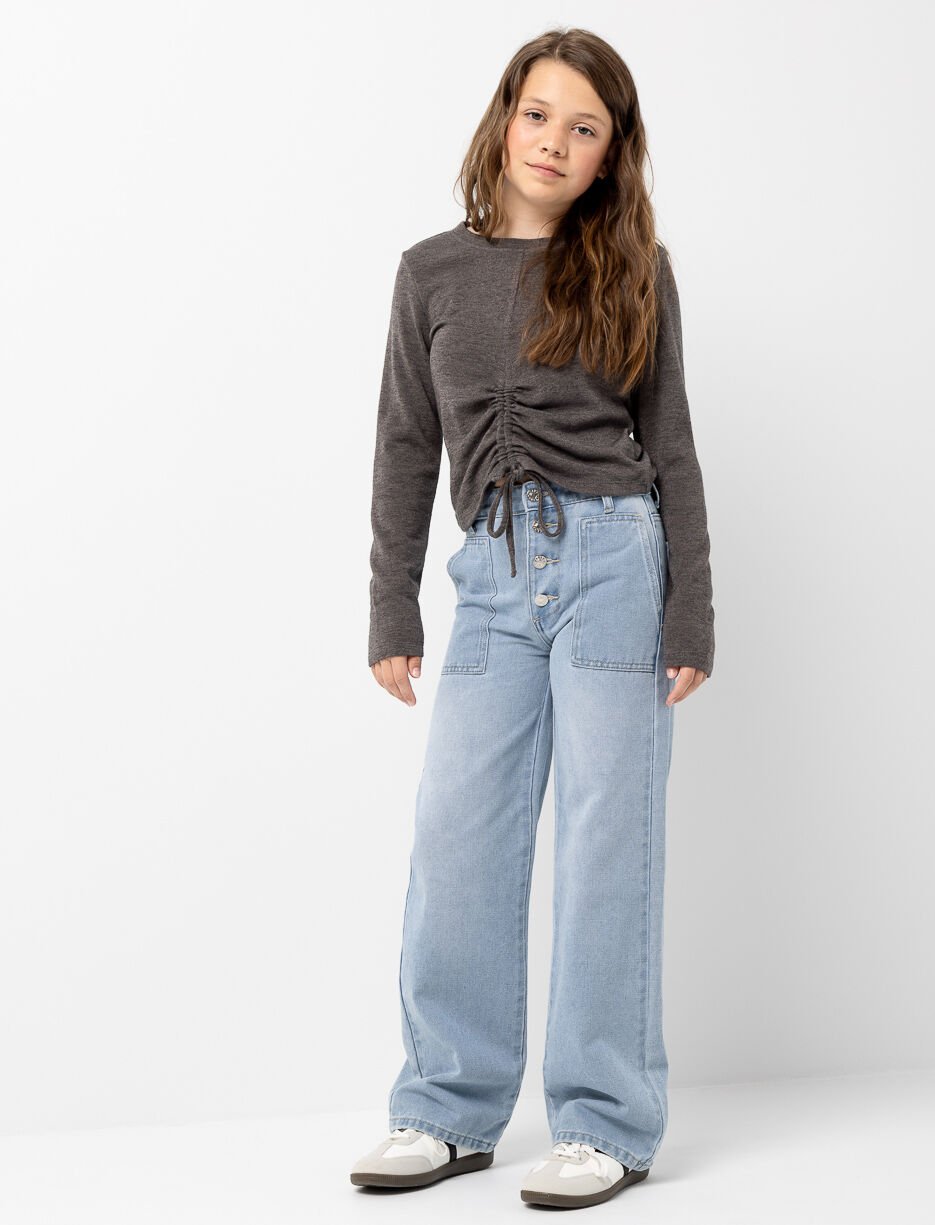 Jean jambe large avec poches plaquées