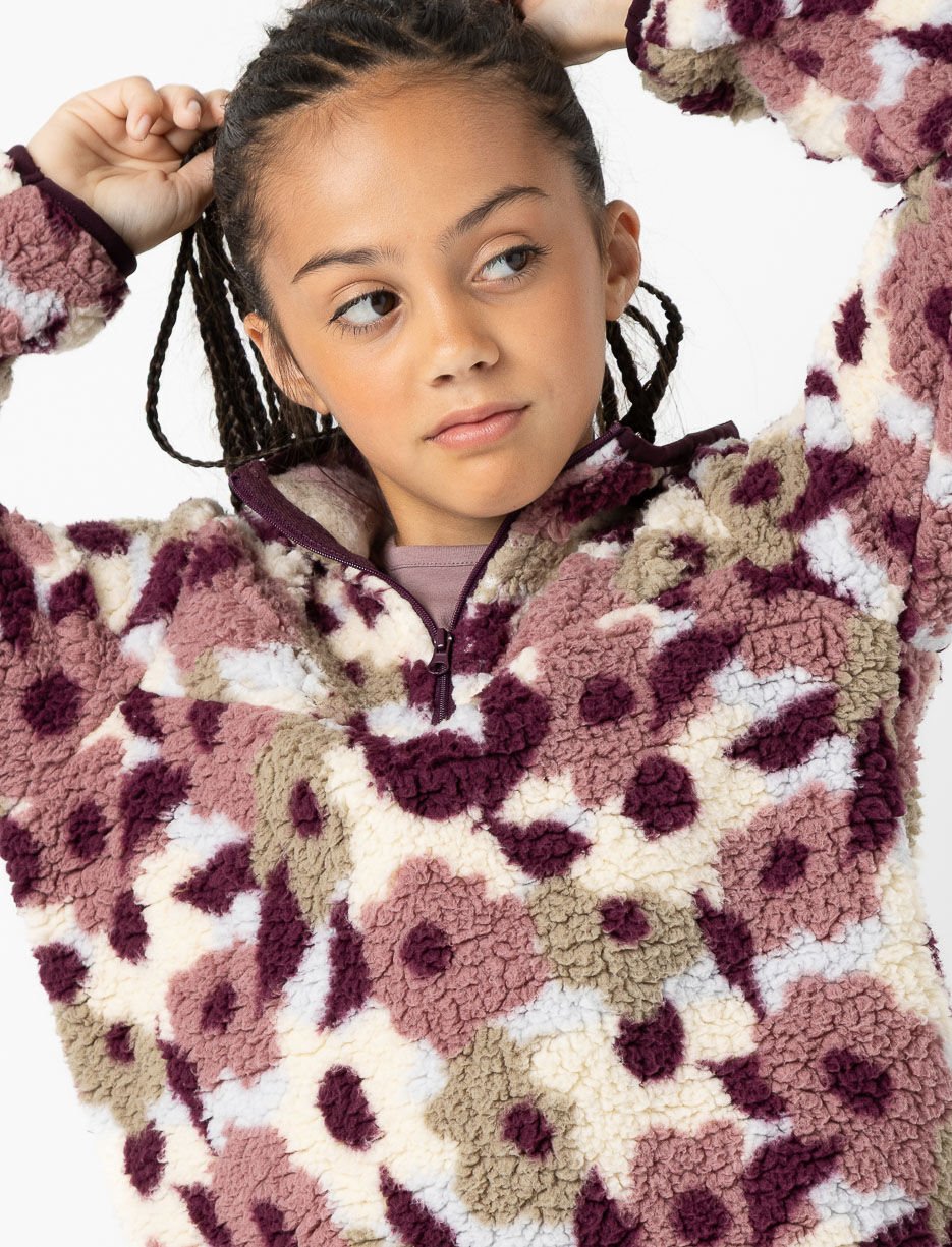 Chandail en sherpa fleuri à demi-zip