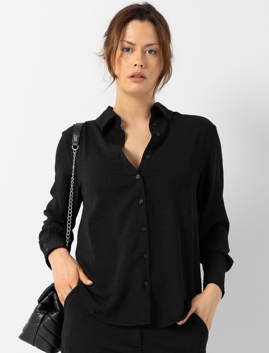 Blouse unie à manches longues