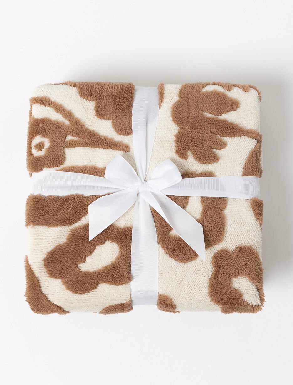 Jeté jacquard sherpa à motif feuillage