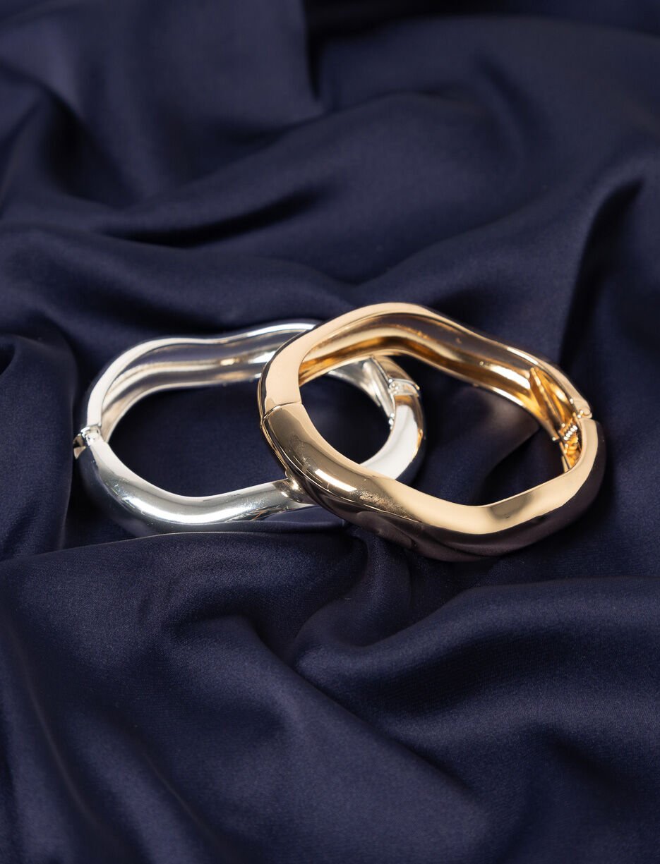 Bracelet rigide à forme ondulée