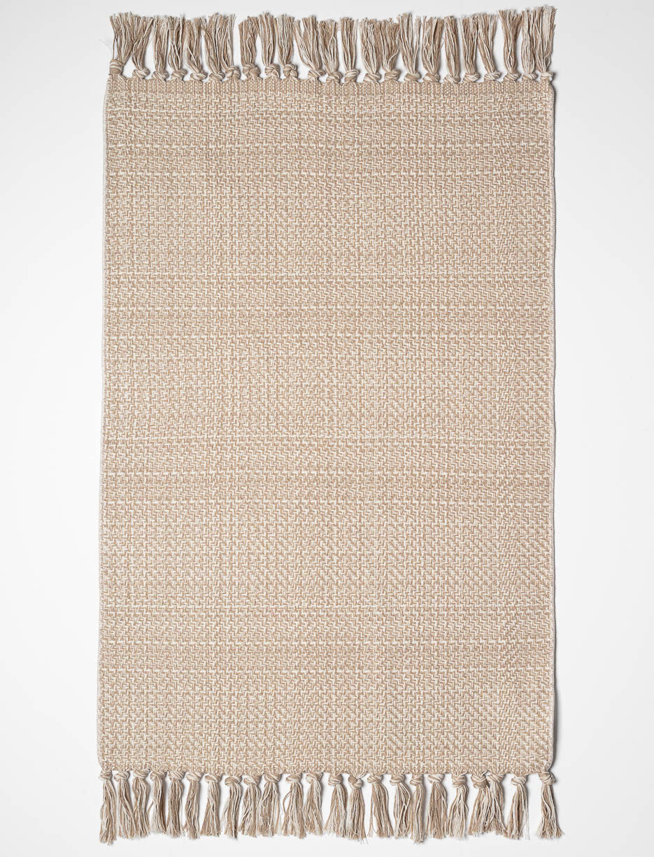 Tapis tissé à franges